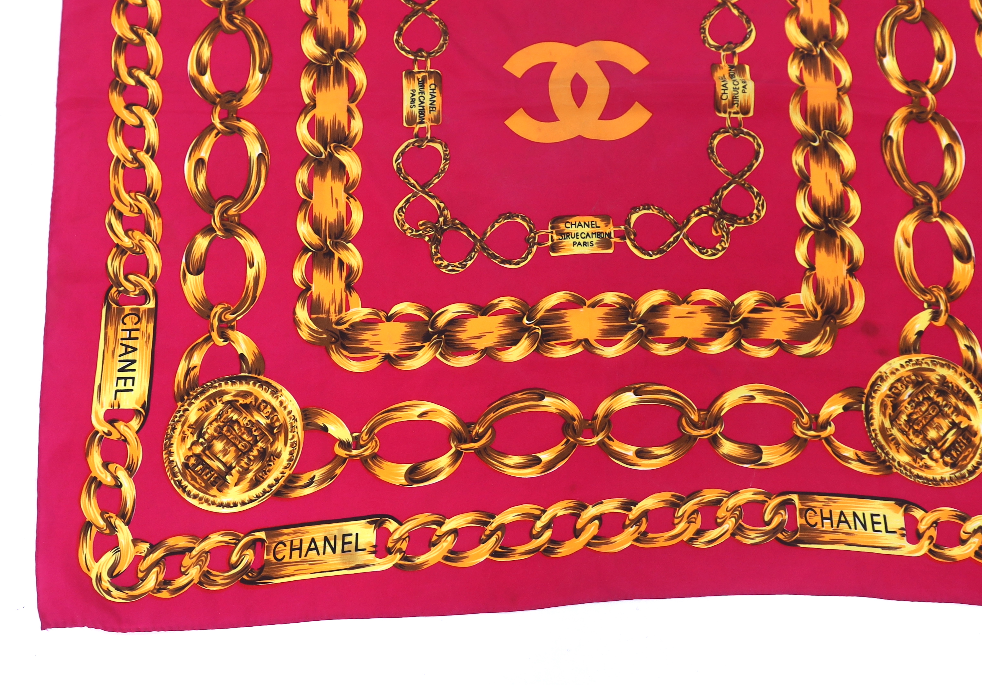 A Chanel Chain pink and gold silk scarf, 80cm x 80cm